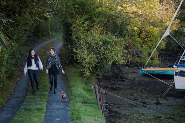 Laura and Roxane of Whyfield walking a dog